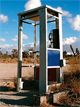Image of a pay phone in the desert
